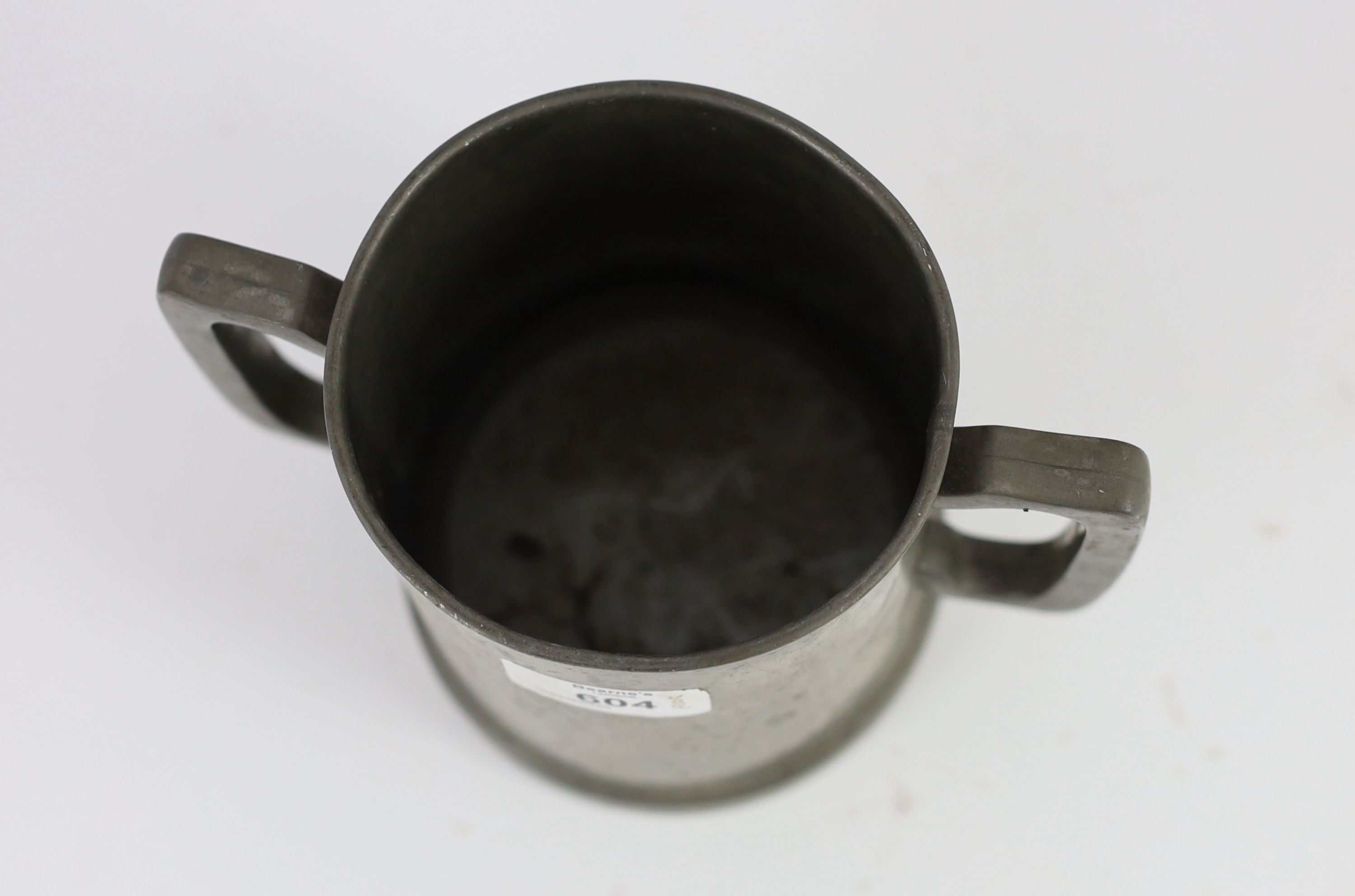 A Victorian pewter two handled presentation mug 'Exeter College Regatta, 1880'